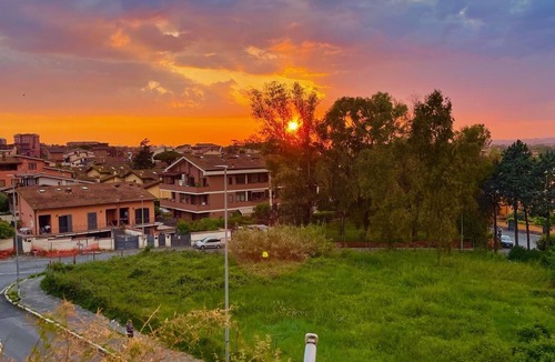 Zona XXXIII Acilia Sud Apartment | SunsetApart Garden of Rome Apartment in green neighborhood