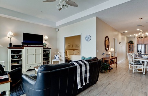 Bradenton Beach Condo | SUNSETS AND DOLPHIN SHOWS AWAIT FROM YOUR BALCONY! Availability is going quick, call today and book your Winter vacation!