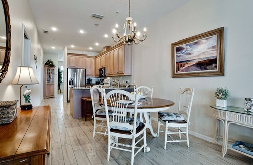 Bradenton Beach Condo | SUNSETS AND DOLPHIN SHOWS AWAIT FROM YOUR BALCONY! Availability is going quick, call today and book your Winter vacation!