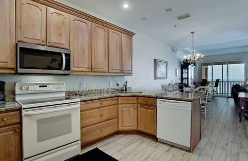 Bradenton Beach Condo | SUNSETS AND DOLPHIN SHOWS AWAIT FROM YOUR BALCONY! Availability is going quick, call today and book your Winter vacation!