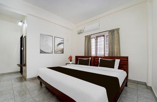 Kulanada Hotel | Super Hotel O Pathanamthitta Near Mahatma Gandhi Statue