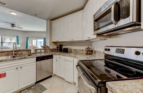 Fernandina Beach Condo | Super Spacious Ocean Park Condo | Pool, Hot Tub & BBQ | Beach Gear Provided