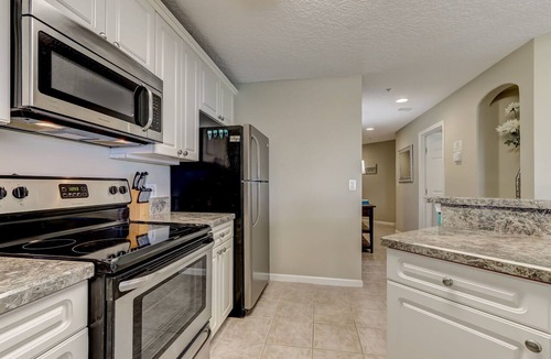 Fernandina Beach Condo | Super Spacious Ocean Park Condo | Pool, Hot Tub & BBQ | Beach Gear Provided