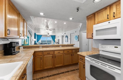 Madeira Beach Condo | Superb Location on the Beaches of Madeira. Great Corner Unit Views. Beachfront Pool on the Sand!