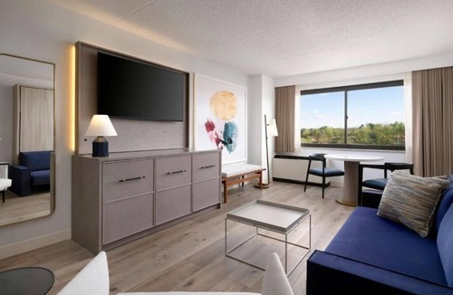 White Plains Hotel | Superior 2BR Comfy Retreat | Bar, Gym, Shuttle & Pets Welcome