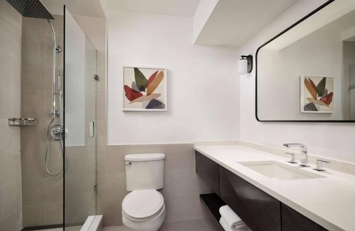 White Plains Hotel | Superior 2BR Comfy Retreat | Bar, Gym, Shuttle & Pets Welcome