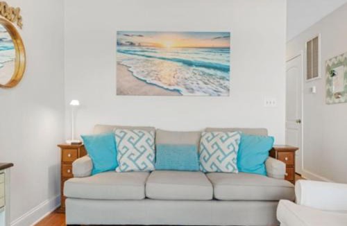 Carolina Beach Apartment | Surf Break - Feel your stress melt away as you relax on the ocean view deck and listen to the waves crash condo