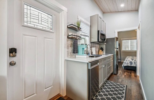 Dunedin House | Surf Shack Tiny Home on Pinellas Trail w/Heated Pool! Walk or Bike to Downtown Dunedin!