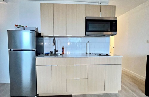 Downtown West Apartment | Sweet Landing,Pool, fitness room in Baltimore