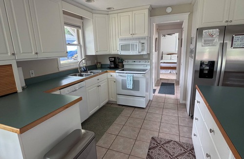 Ludington Cottage | Sweetwater Cottage on channel of Lower Hamlin Lake
