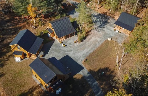 Woodsville Cabin | Swiftwater Full Property - 4 Cabins - Sleeps 16