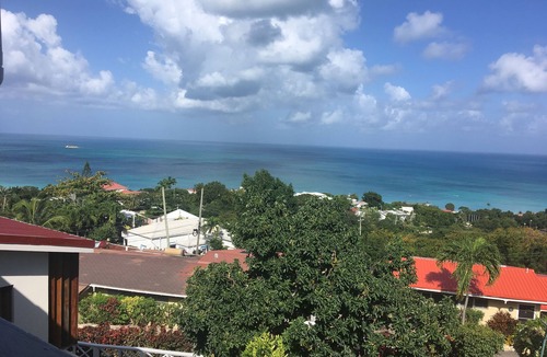 Dickenson Bay Apartment | Swimming Pool- Balcony/Veranda- Sea & Sunset Views