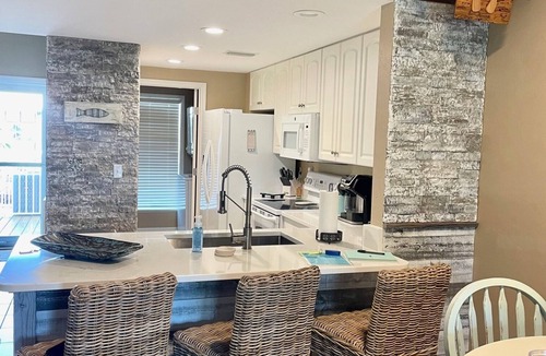 Suwannee Condo | Tailin’ Reds Suwannee Gulf Condo. Private Boat Slip. Building 1 Unit 102