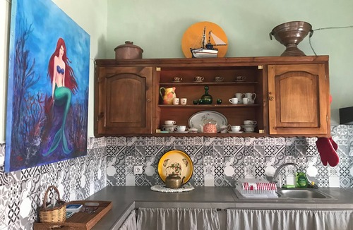 Telendos Cottage | Telendos Gallery house :artistic,cozy retreat by sea, trees and mountain views.