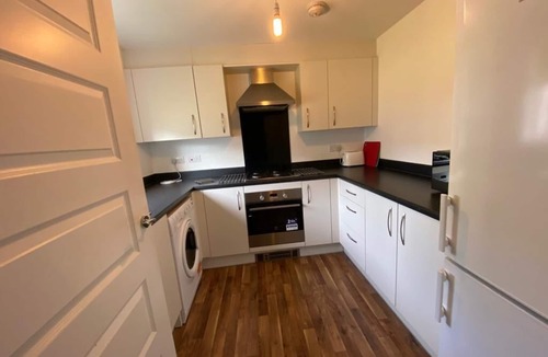 Longcroft House | Terraced whole 3 bed house with allocated parking near the airport