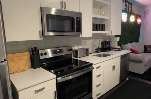 Central Business District Apartment | The 513 Flat II! Pool & River View! Free Gated Parking! Walk to Banks & Stadium!
