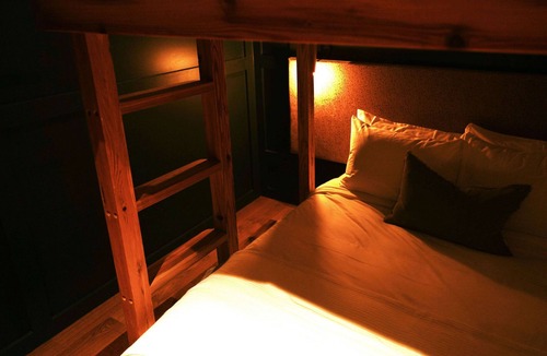 Fredericksburg Hotel | The Albert | Bunk Room | 4 Queen Beds, Pool & Lounge Area