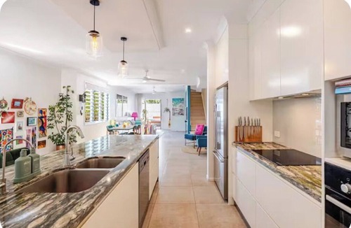 Tugun House | The Art Garden: a coastal retreat with sauna and longboard steps from the beach