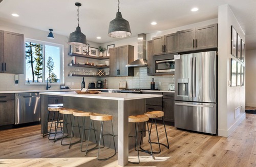 Philipsburg House | The Basin is a modern, luxury cabin nestled in the pines at the base of Discovery Ski Hill. Enjoy panoramic views of the surrounding forest and the relaxing sounds of a nearby creek while relaxing by a smokeless fire in the Solo stove on the deck.