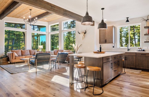 Philipsburg House | The Basin is a modern, luxury cabin nestled in the pines at the base of Discovery Ski Hill. Enjoy panoramic views of the surrounding forest and the relaxing sounds of a nearby creek while relaxing by a smokeless fire in the Solo stove on the deck.