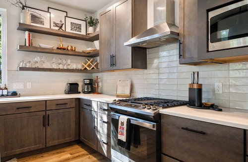 Philipsburg House | The Basin is a modern, luxury cabin nestled in the pines at the base of Discovery Ski Hill. Enjoy panoramic views of the surrounding forest and the relaxing sounds of a nearby creek while relaxing by a smokeless fire in the Solo stove on the deck.