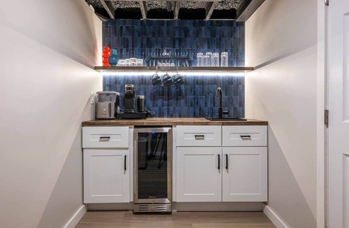 Lee's Summit House | The Blue Villa - Hot Tub, Fire Pit, Game Room, EV Charger, Walk to DTWN LS