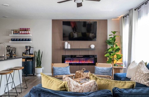 Lee's Summit House | The Blue Villa - Hot Tub, Fire Pit, Game Room, EV Charger, Walk to DTWN LS
