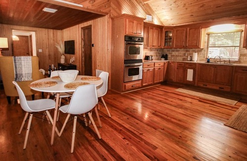 Bearss Plaza Cabin | The Cabin in The City with Outdoors Living Space