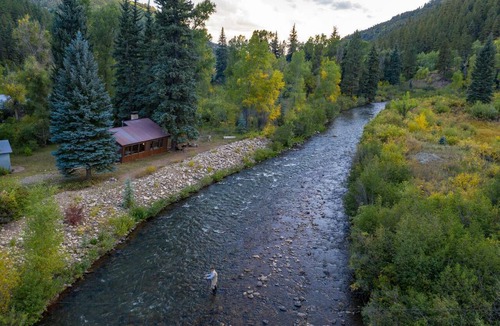 Dolores Cabin | The Call of the Water - Private luxury cabin on river in San Juan Nat Forest!