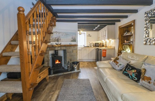 Marianglas Cottage | THE COTTAGE, pet friendly, with open fire in Marian-Glas