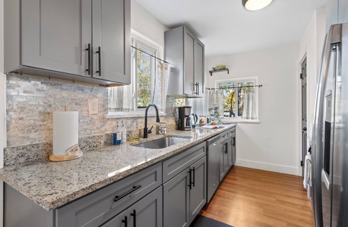Clinton Township House | The Drift House- Spacious Boho Family Retreat- 4 bds, 2 baths, 6 TVs, Movie Room