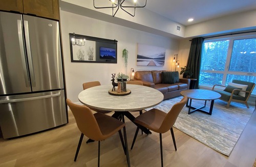 Dead Man's Flats Apartment | The Emerald Mountain Getaway w/Pool, hot tub and fitness room.