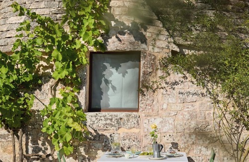 Ostuni Villa | The Guardian, refined trullo with pool surrounded by nature