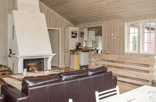 Horten House | The hidden house in the forest- built on rocks, with large terrace and view of the lake.