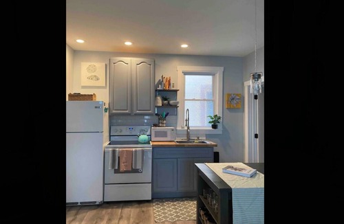 Catskill Apartment | The Hideaway a large studio that sleeps 4 with a fireplace and tub shower
