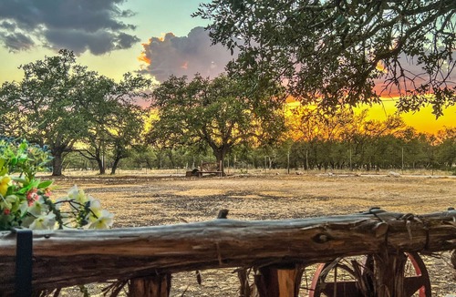 Mountain Home Cabin | The Hitchin' Post Cabin- Texas Hill Country Western-themed cabin for 4 in the woods near Kerrville & Fredericksburg