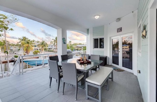 Twin Lakes House | The Key Largo Oasis, a Beautiful Waterfront Home with 60’ Dock and Pool