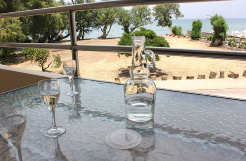 Kato Stalos Apartment | The "LifeGuard" Seafront Luxury Flat, 15meters from beach!