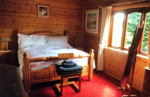 Cromarty Firth Cabin | The lodge has spectacular views of Cromarty Firth and Ben Wyvis mountain range.