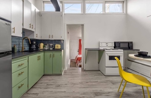 Drumheller Apartment | The Mango Vibrant Oasis Sleeps 4 Downtown Fun