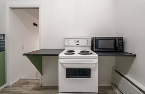 Drumheller Apartment | The Mango Vibrant Oasis Sleeps 4 Downtown Fun