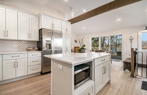 Sturgis House | The Maple & Oak - Lakefront Home with Private Beach