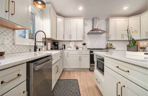 Sturgis House | The Maple & Oak - Lakefront Home with Private Beach