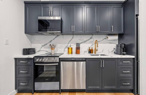 Grange Park Apartment | The McCaul | Newly Designed Group Suite Near FIFA