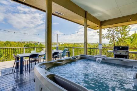 Dripping Springs House | The Outlook - Spa and deck views of Hill Country