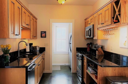 Buena Vista House | The Red Farmhouse at South Main welcomes you! Steps away from the River Trails!