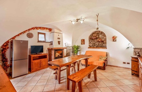 Zignago House | The Rustico di Zignago, located in the picturesque area of ​Debbio, offers a unique experience that seems to transport you to another era.This rustic house is the ideal refuge for those seeking tranquility and authenticity.Ground Floor:Living Room w