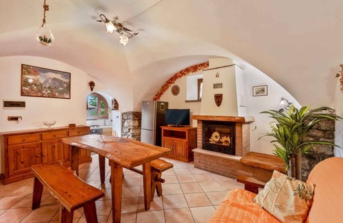 Zignago House | The Rustico di Zignago, located in the picturesque area of ​Debbio, offers a unique experience that seems to transport you to another era.This rustic house is the ideal refuge for those seeking tranquility and authenticity.Ground Floor:Living Room w