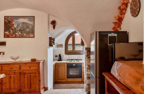 Zignago House | The Rustico di Zignago, located in the picturesque area of ​Debbio, offers a unique experience that seems to transport you to another era.This rustic house is the ideal refuge for those seeking tranquility and authenticity.Ground Floor:Living Room w