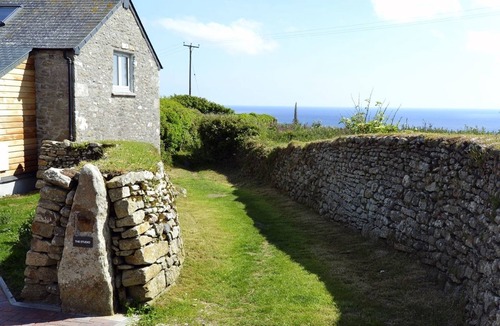 Saint Erth Praze Cottage | THE STUDIO, pet friendly, with open fire in Rinsey Cove